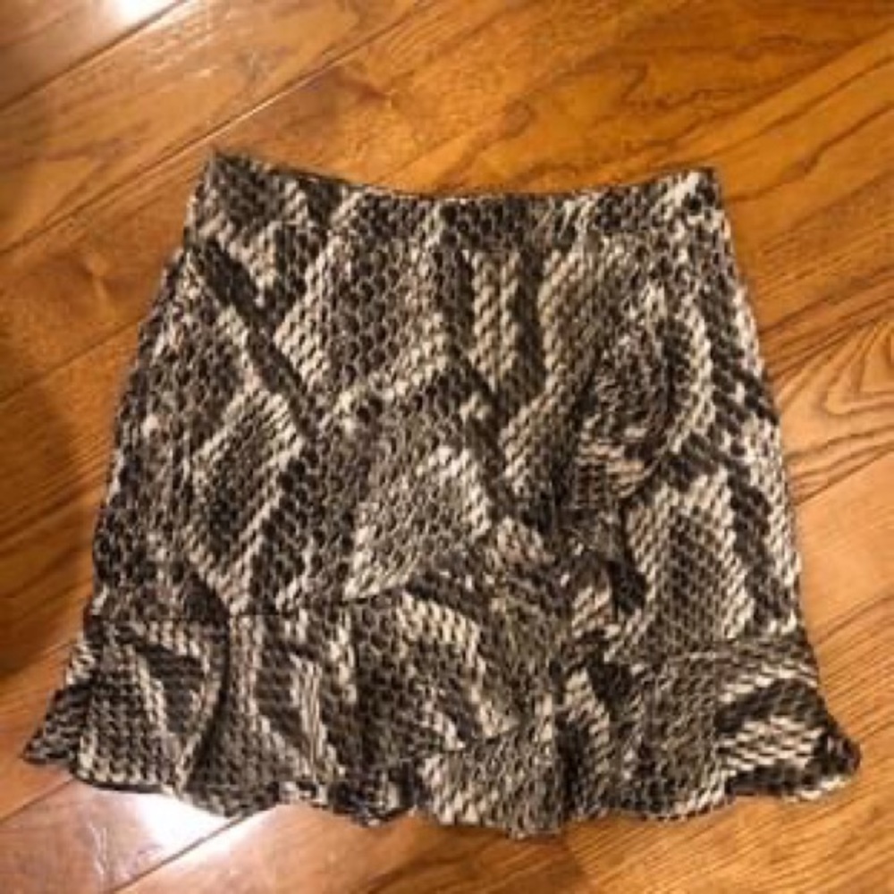 OLIVACEOUS ruffle skirt - fully lined - size small.  Snake reptile print
